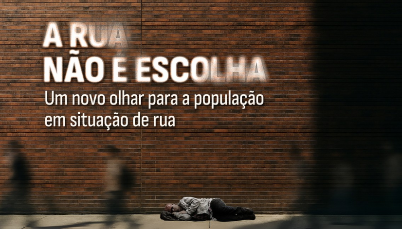 imagem com o texto a rua não é escolha pintado em muro de pedra com uma pessoa dormindo na calçada